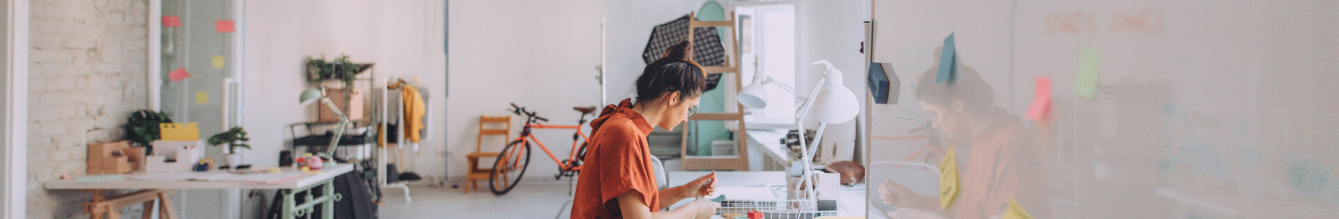 Graphic designer sitting at desk