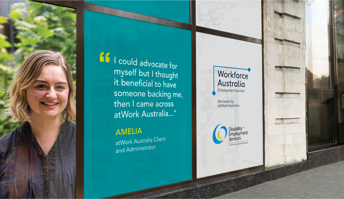 Outdoor floor-to-ceiling windows outside an office building with atWork Australia and Worforce Australia print signage on it