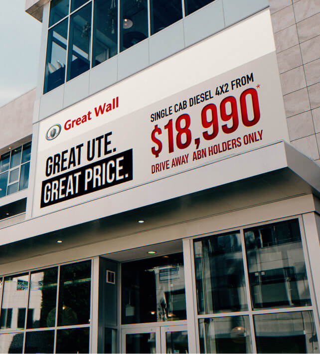Outdoor signage for a car brand on the side of a building, designed by MOO marketing agency in Melbourne